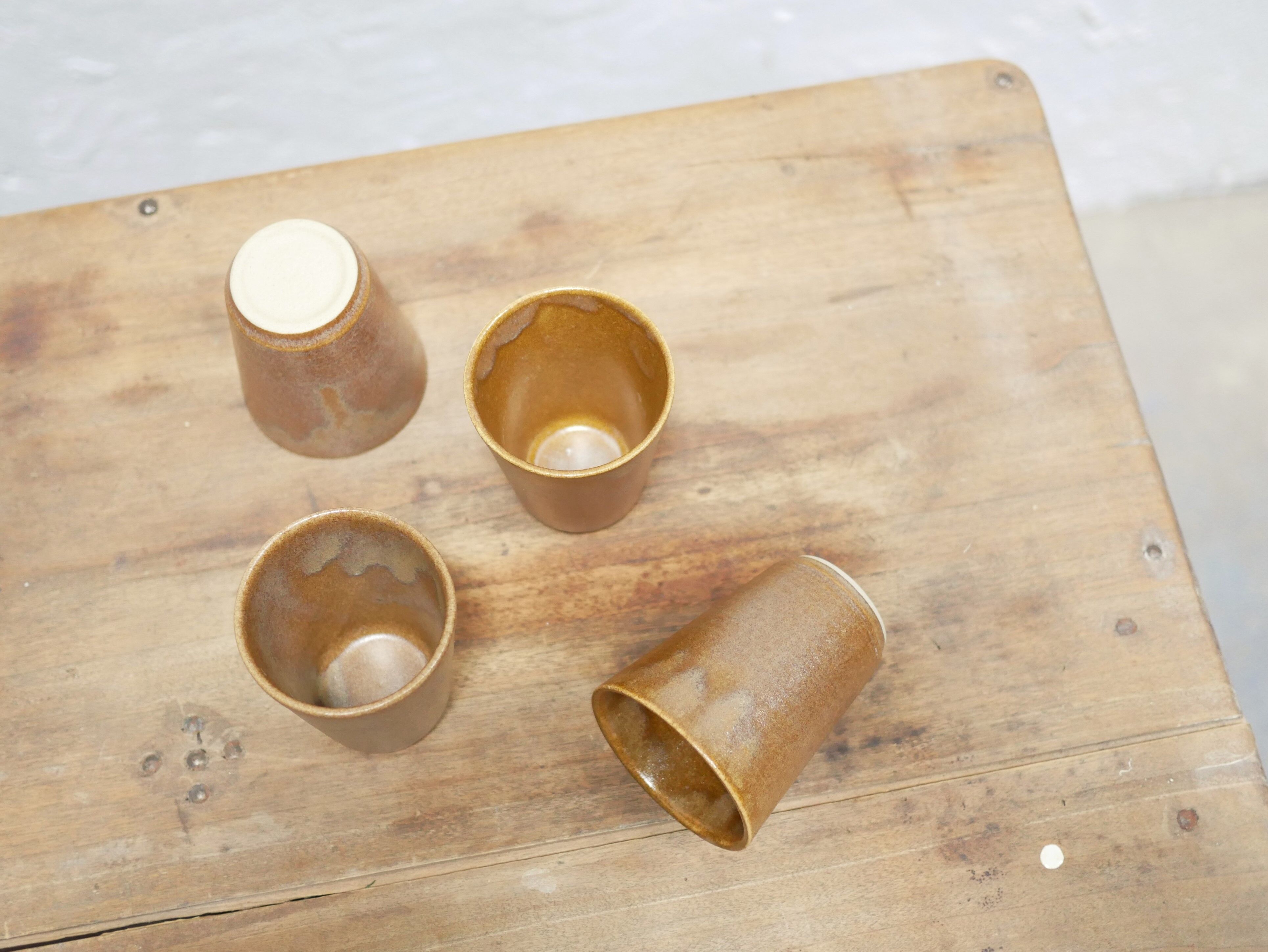 Series of 4 vintage stoneware glasses by the manufacture of Digoin, France