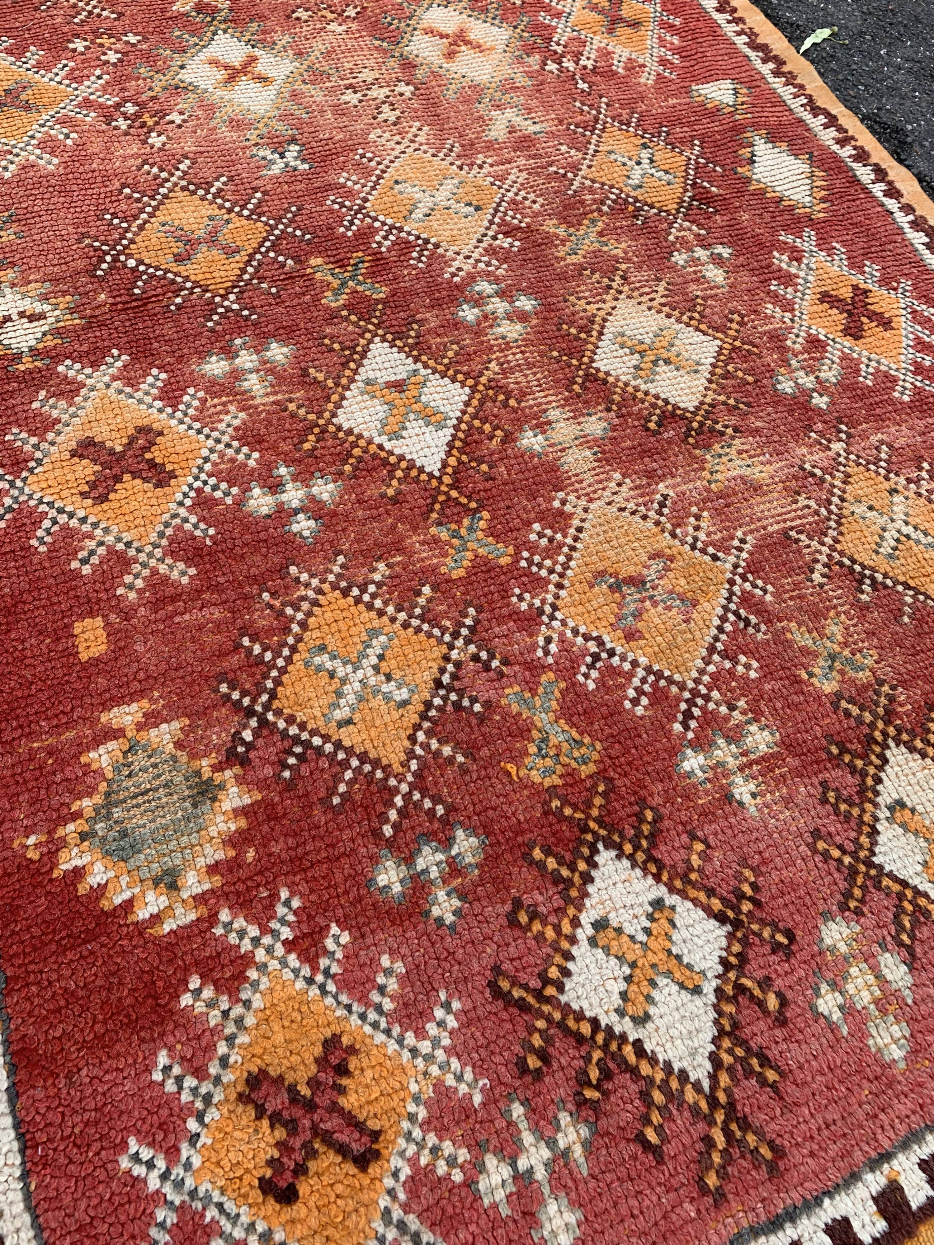 Old orange kilim carpet