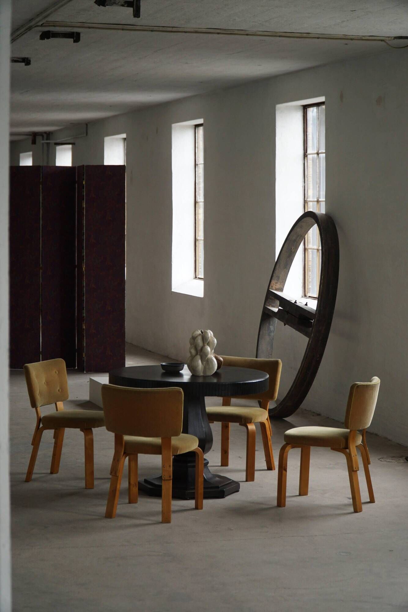 Dining table / round console in Danish Art Deco style in blackened oak, early 20th century.