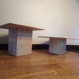 Pair of nesting travertine coffee tables