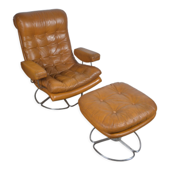Fauteuil pivotant et son ottoman en cuir