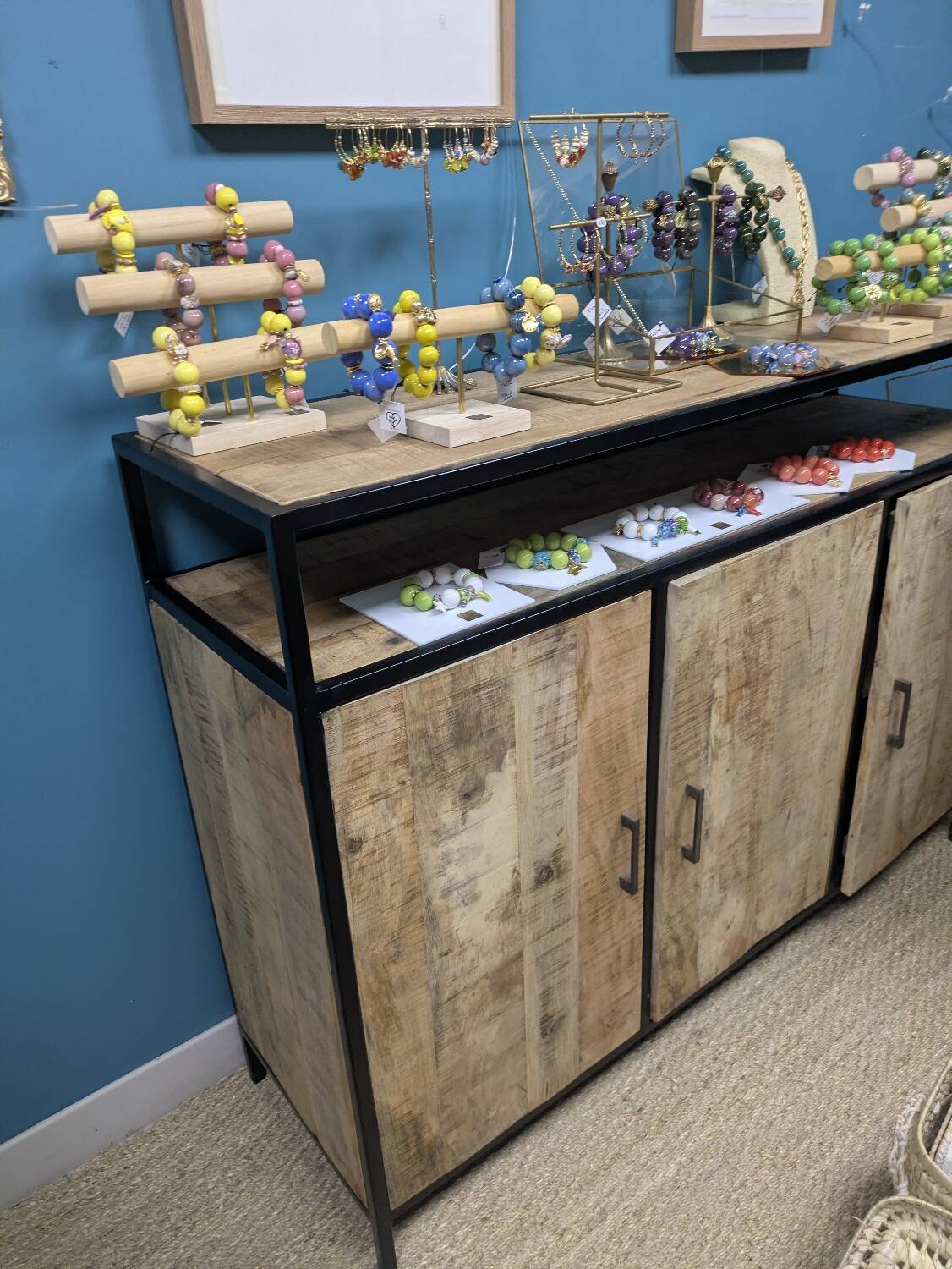 Industrial-style buffet made of solid mango wood.