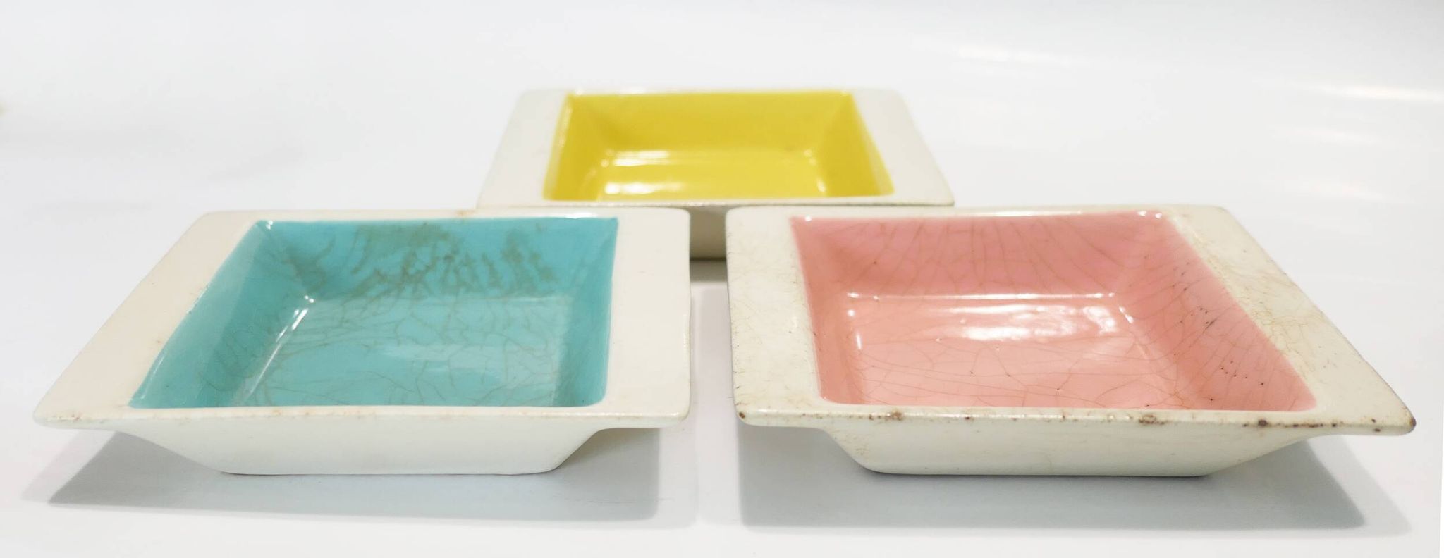 Set of three German ceramic catchalls from the 1950s.