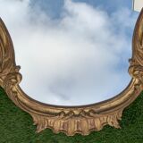 Old mirror in carved wood and gilded leaf, Louis XV rocaille style, twentieth century 59x87cm