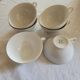 6 white and gold porcelain cups