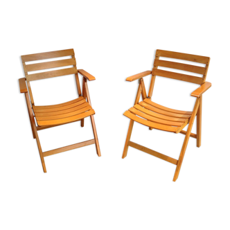 Pair of folding armchairs in varnished wood signed Clairitex