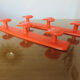 Orange plastic wall coat rack "syla" france 1970
