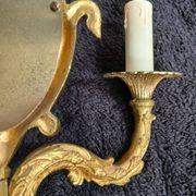Pair of wall sconces with mirrors. Putti. Bronze. Floral Art Nouveau.