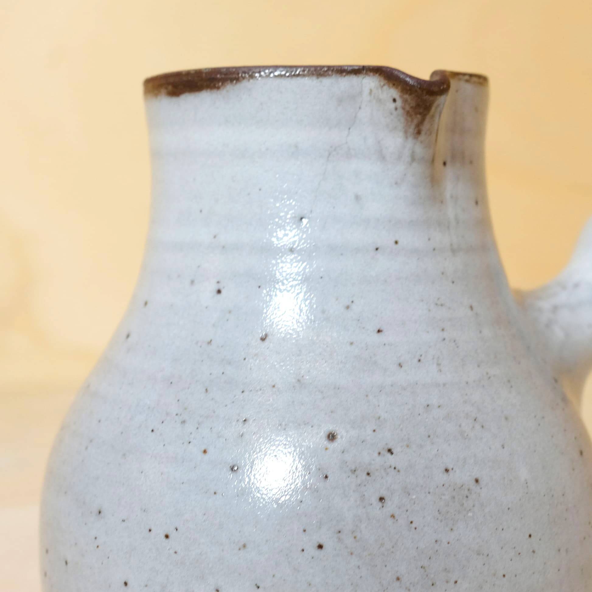 Jeanne and Norbert Pierlot, enamelled stoneware teapot and stopper, 26cm.