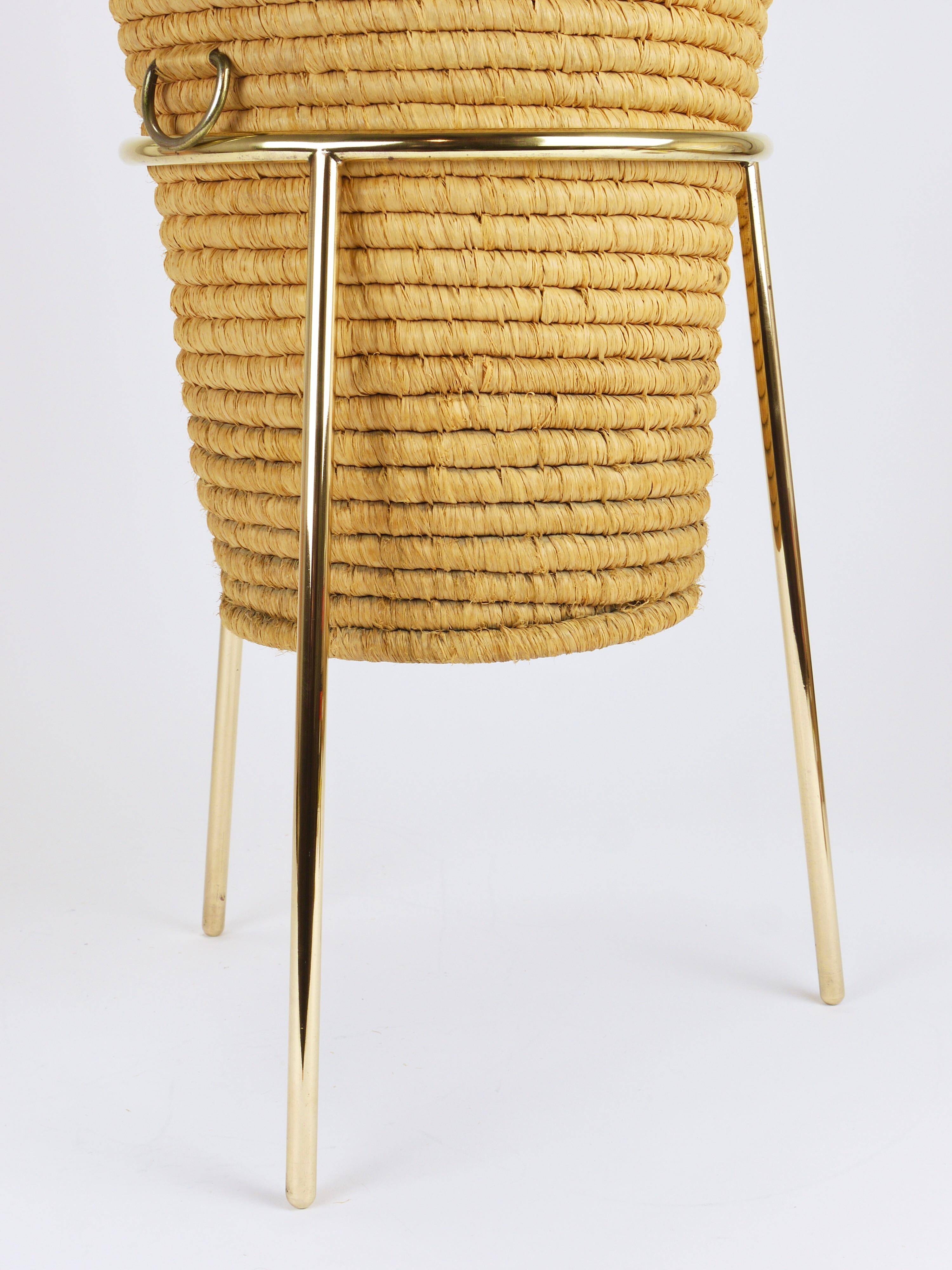 Carl Auböck II paper basket in raffia and brass, umbrella stand, 1950s