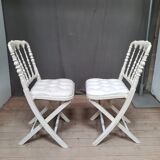 Pair of upholstered folding chairs
