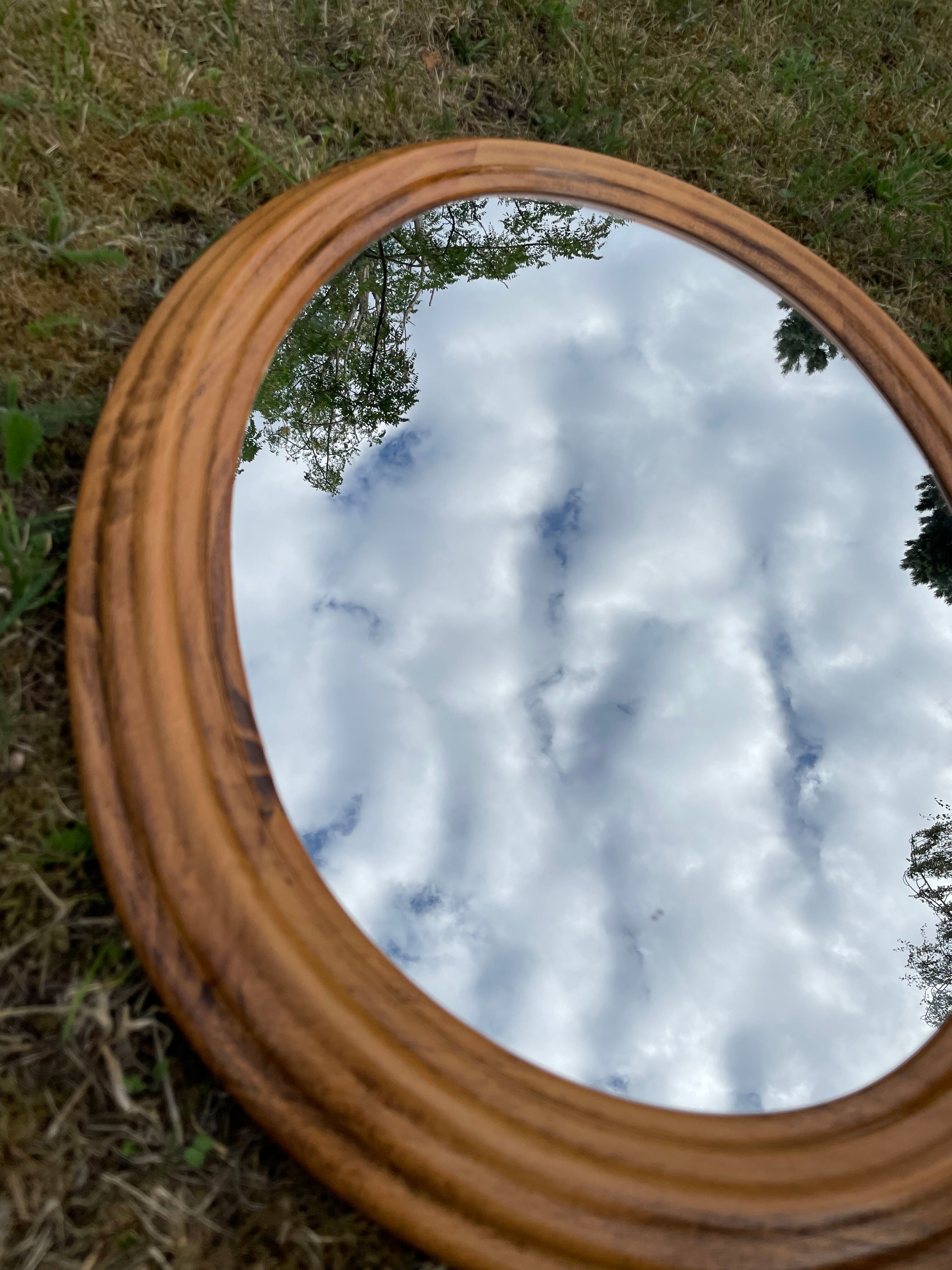 Oval wooden mirror 46x72cm
