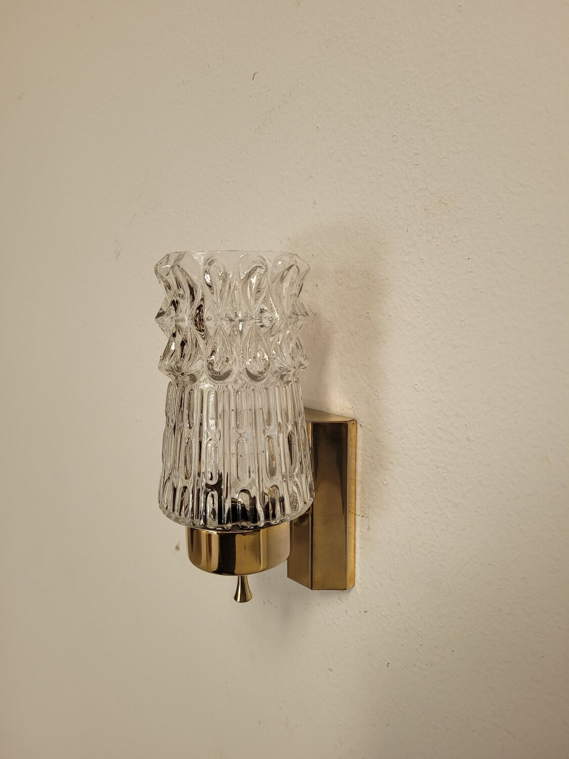 Pair of vintage brass and glass wall lights from the 1960s
