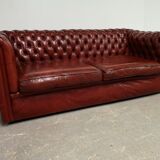 Old red leather Chesterfield sofa