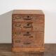 Small Japanese desk chest in oak and red pine, mid-Showa period, circa 1945–1970.