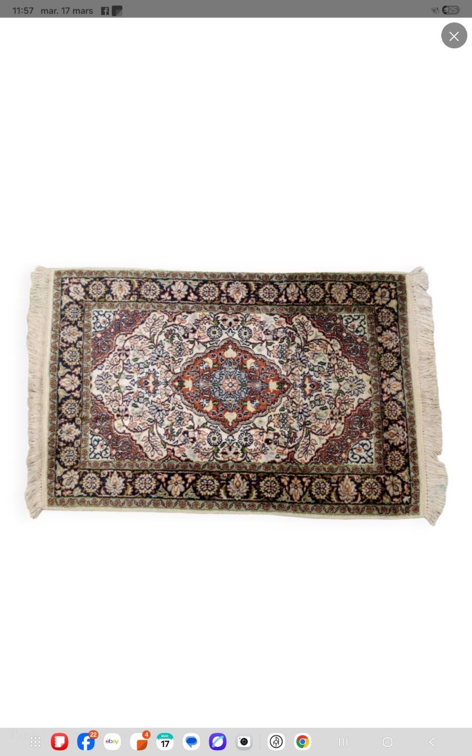 Handmade Persian carpet in wool and silk.