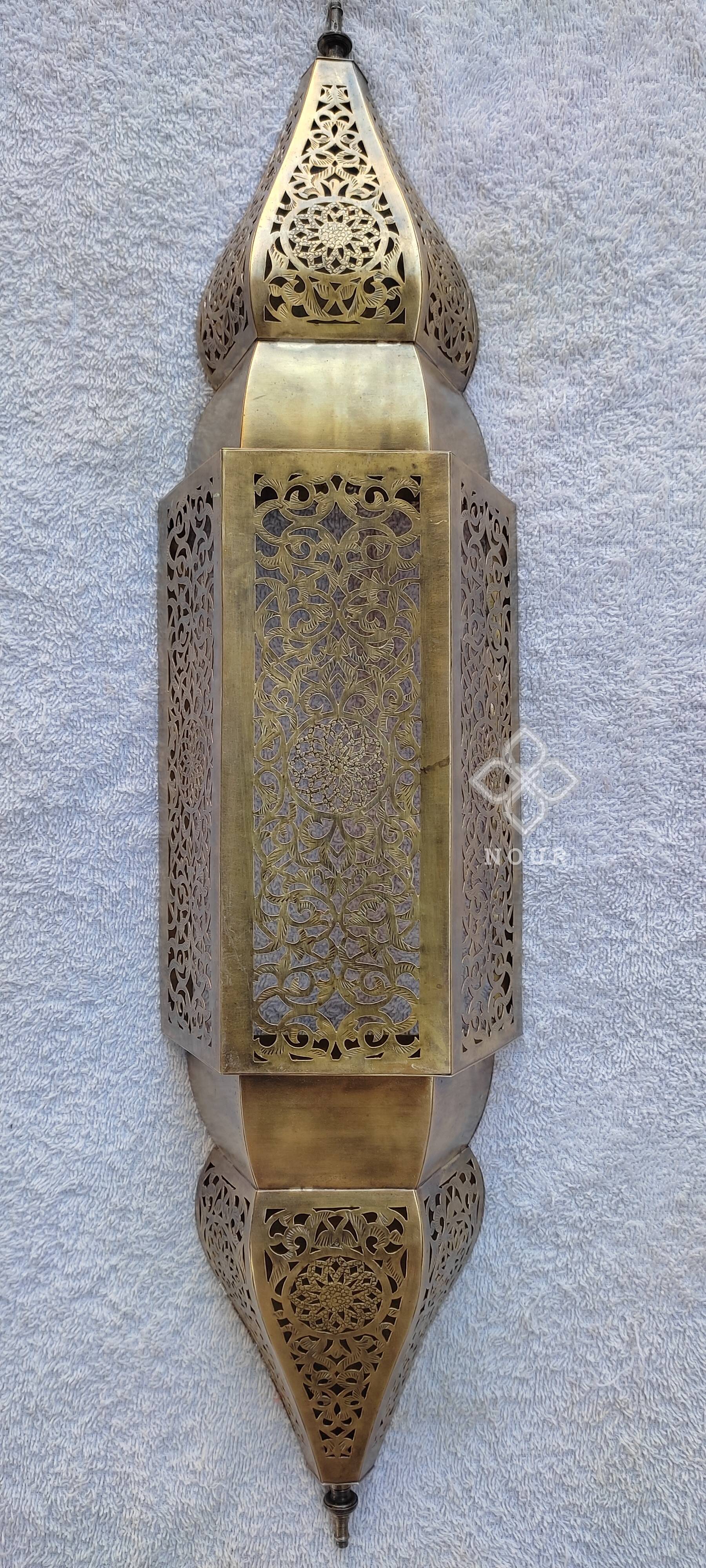 Moroccan brass wall lamp with an antique look