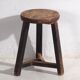 Antique round dark colored stool (c.1900)