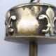 Ashtray on foot. Bronze and brass, with fleur-de-lis decoration.