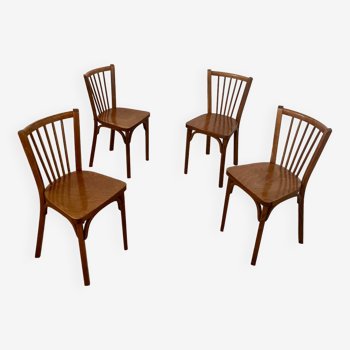 Lot de 4 anciennes chaises de bistrot baumann vintage en bois