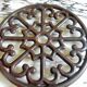 Brown enamelled cast iron trivet