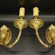 Pair of wall sconces with female masks in Louis XVI style - gilded bronze