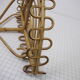 Half-moon rattan shelf and coat holder