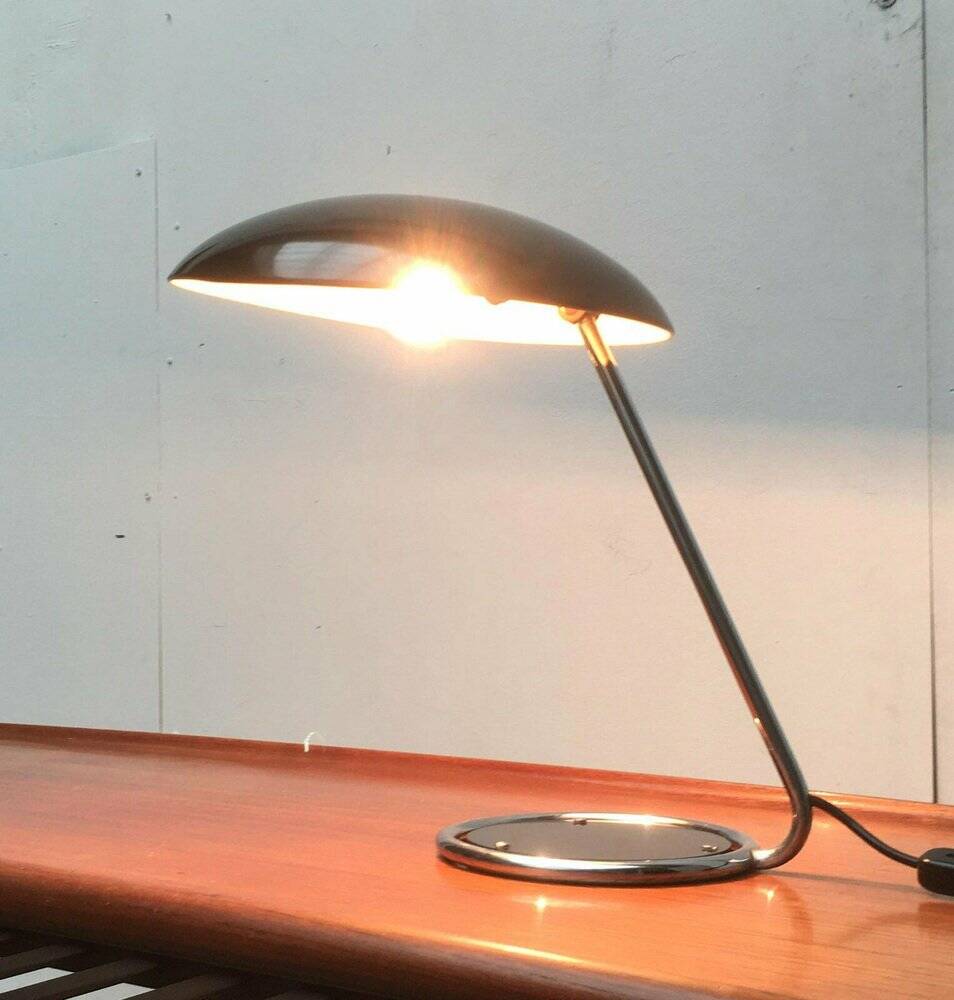 Metal table lamp model 6761 from the mid-century German period by Christian Dell for Kaiser Leuchten, 1960s.
