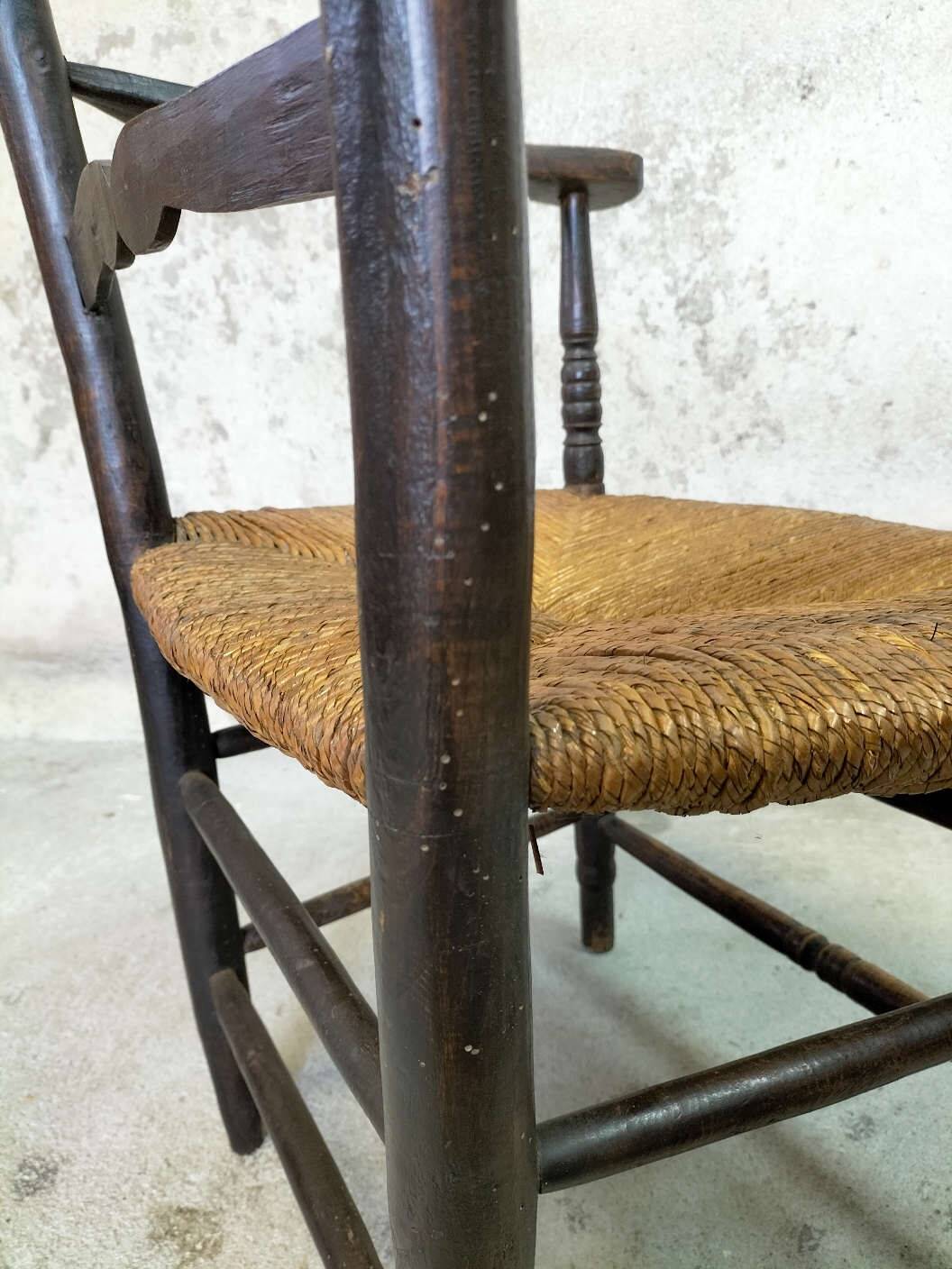 High back straw armchair