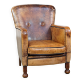 Fauteuil unique en cuir de mouton ancien