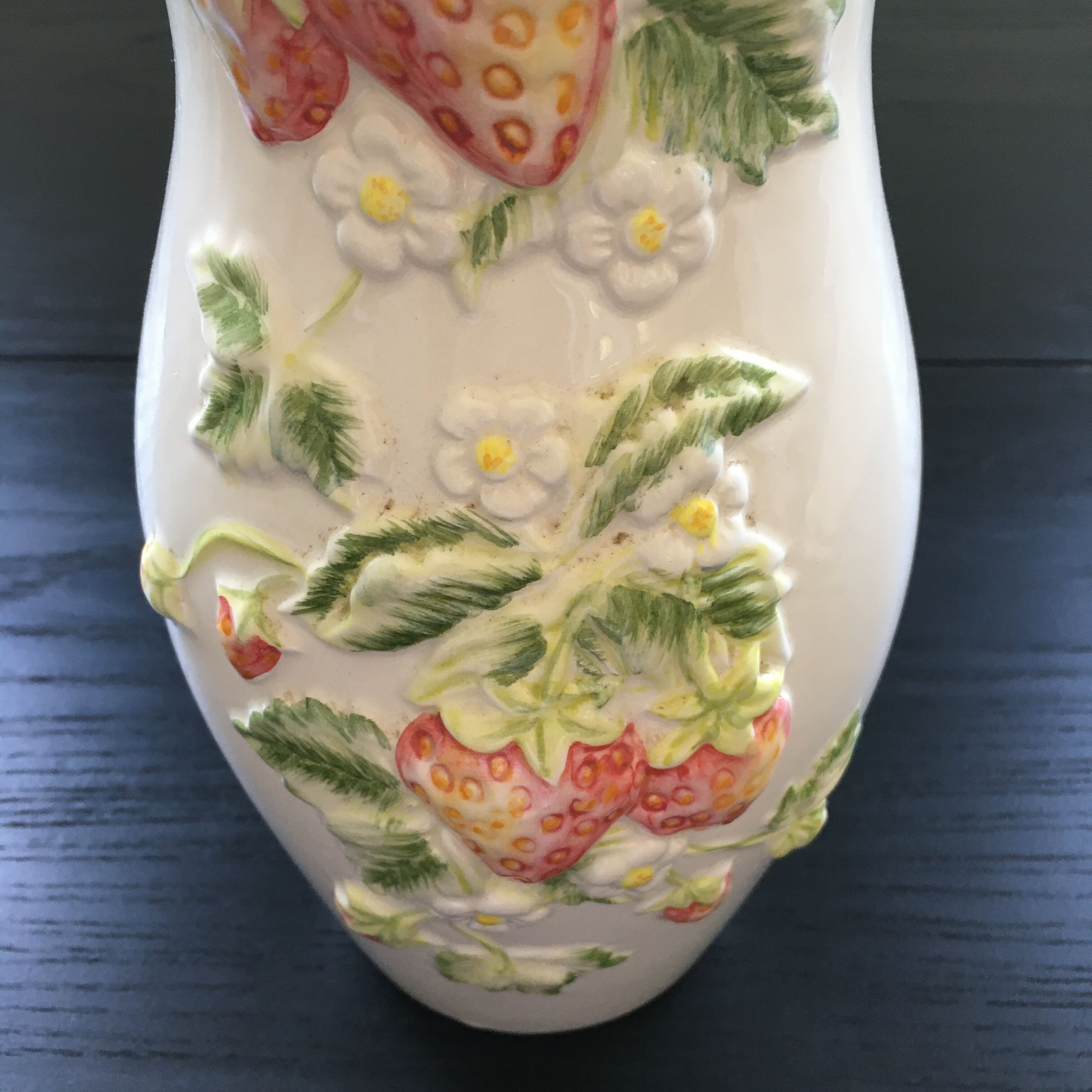 Vase decorated with strawberries in slip