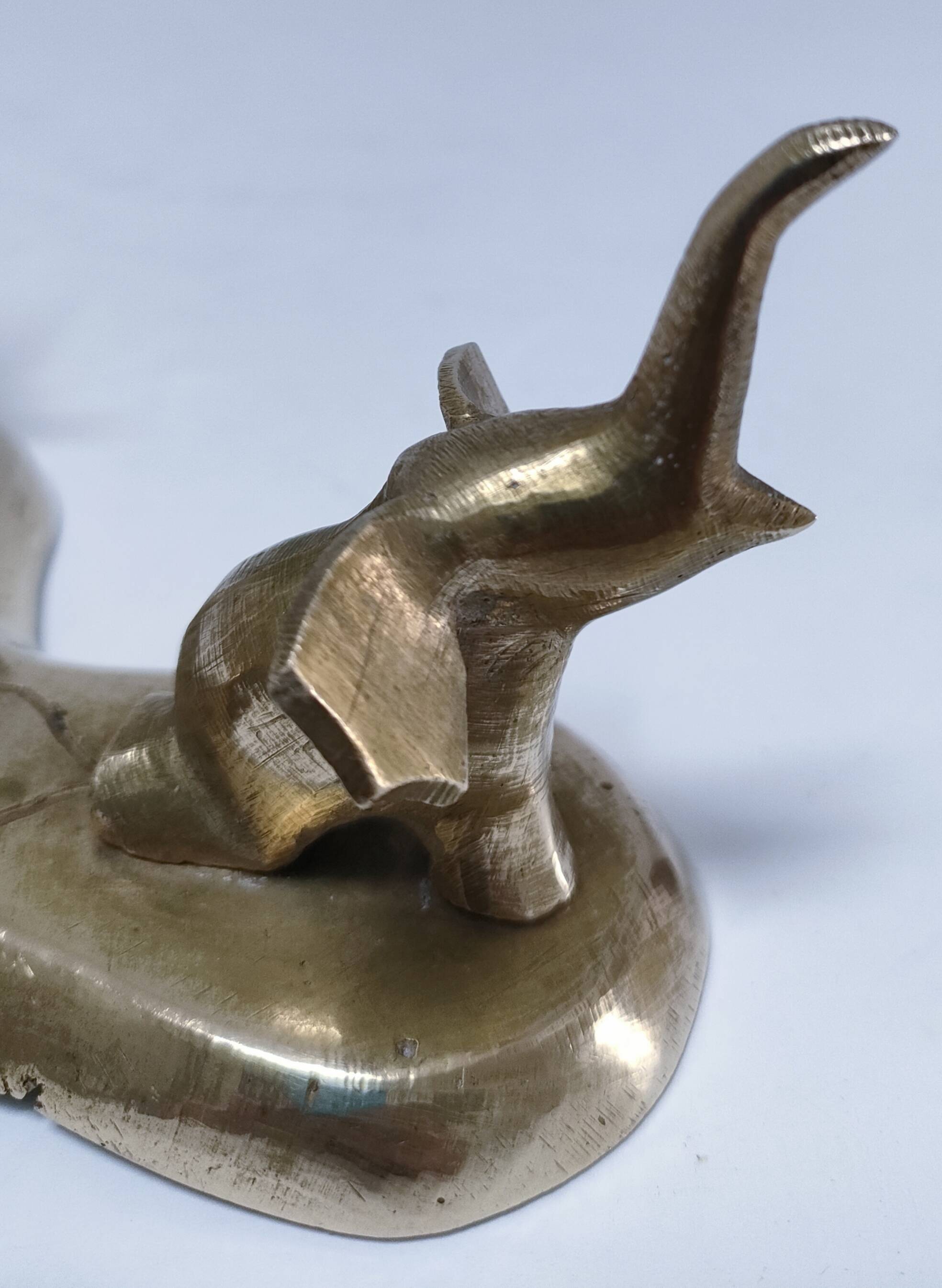 Solid brass elephant pocket emptier from the 80s
