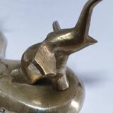Solid brass elephant pocket emptier from the 80s