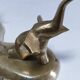 Solid brass elephant pocket emptier from the 80s