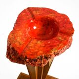 Two mid-century standing ashtrays consisting of red Alabaster cup