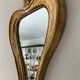 Miroir doré vintage avec selette
