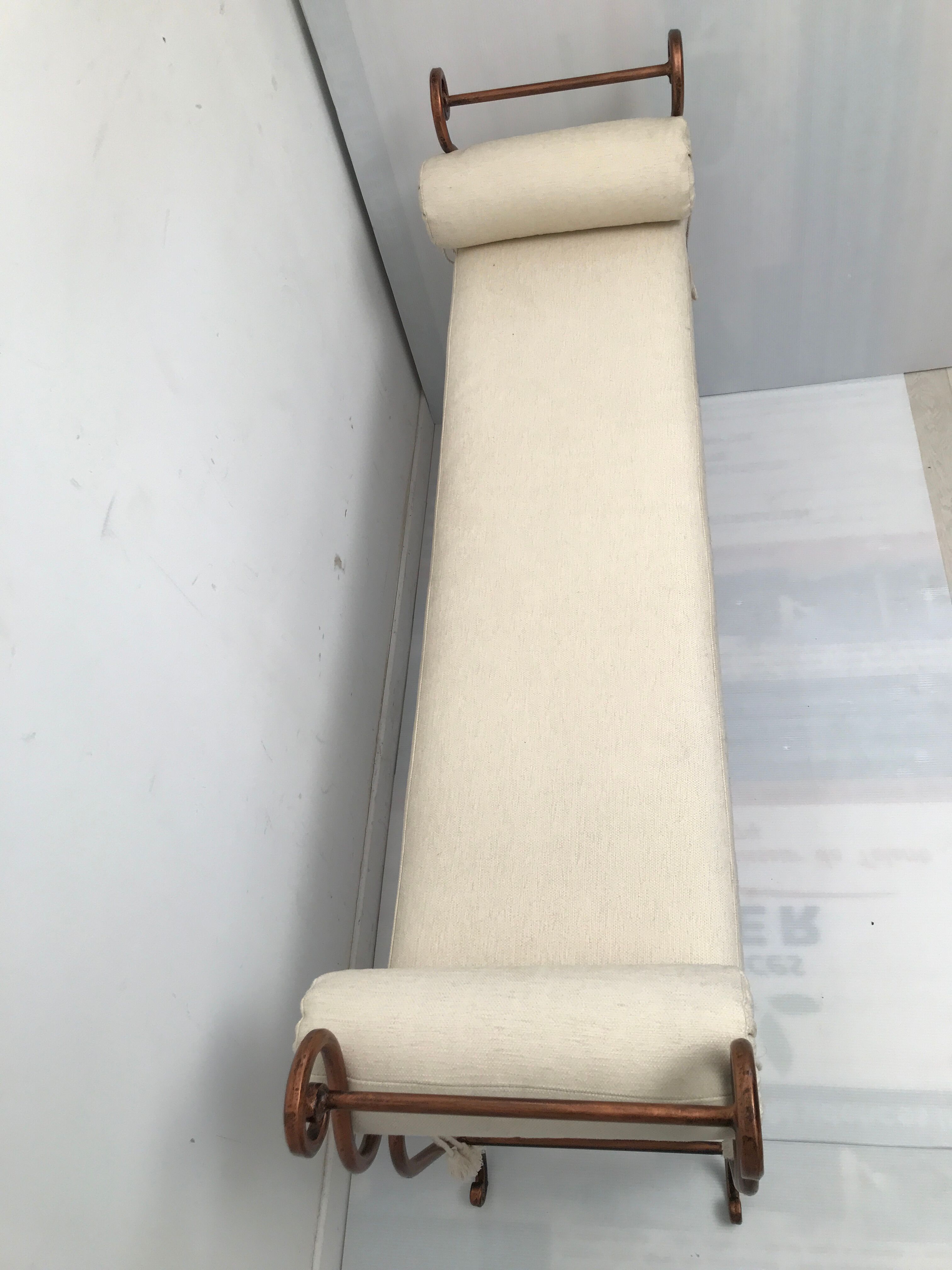 Copper wrought iron bench with cushions