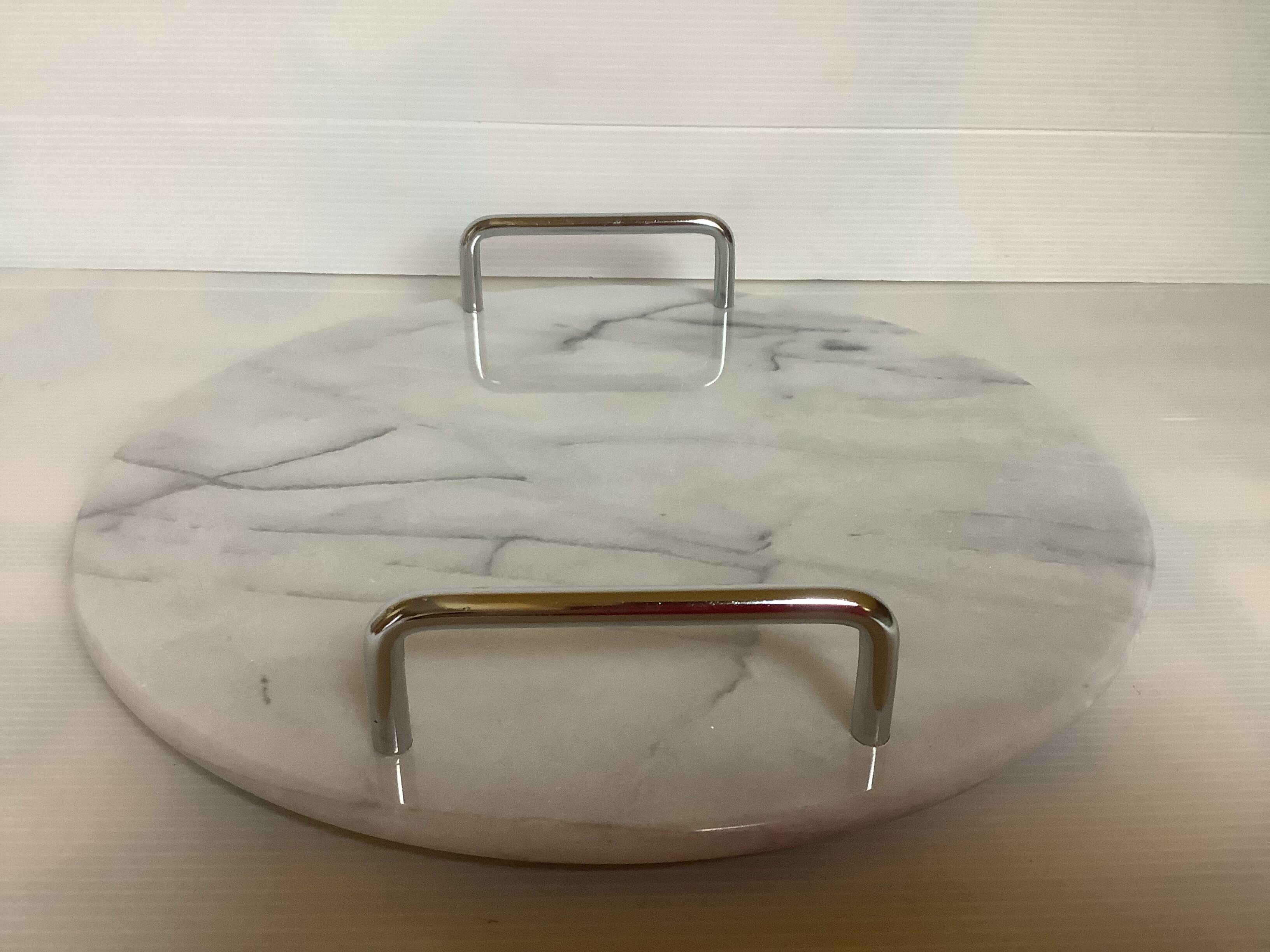 Marble dish with chrome metal handles