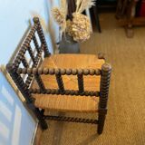 Corner chair in turned wood and straw