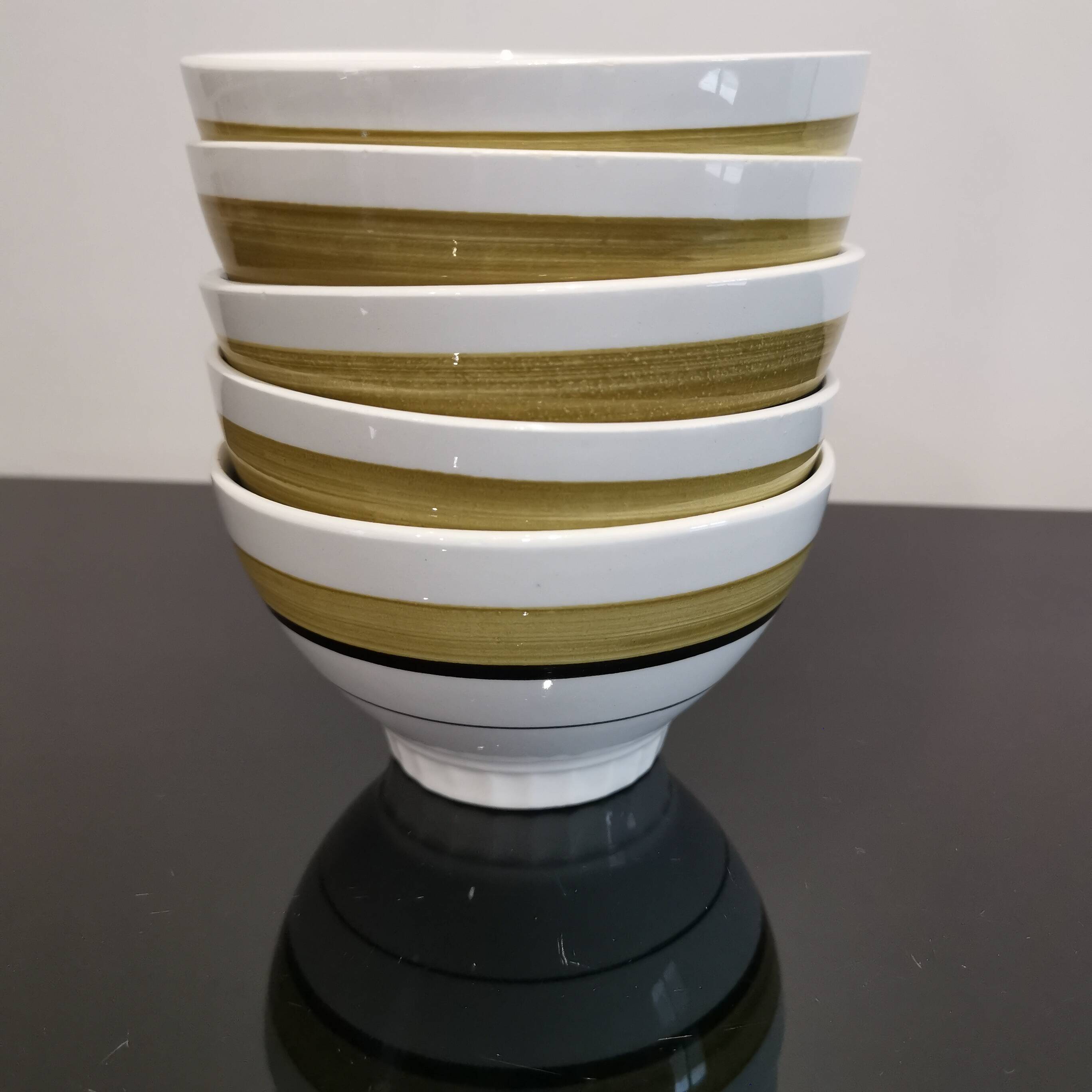 Series of 5 small old earthenware bowls with olive green edging