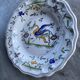 Hollow dish in glazed terracotta, signed