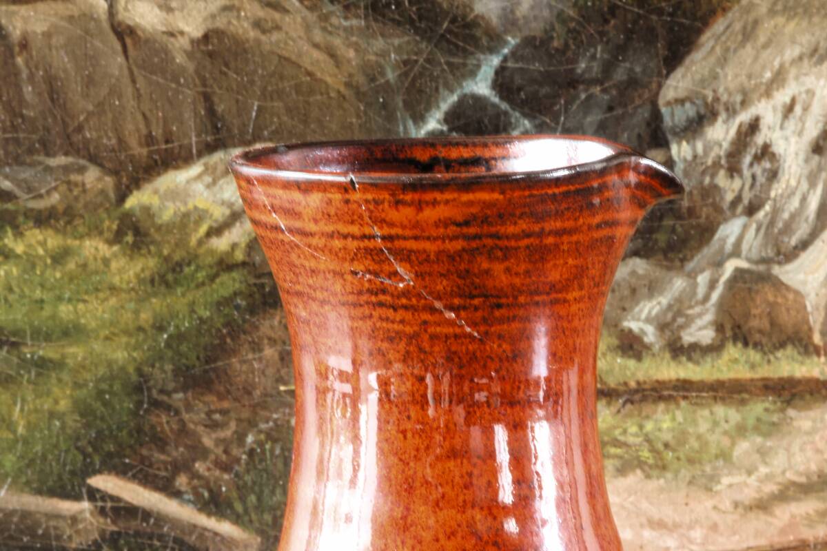 Signed orange ceramic candle holder and jug