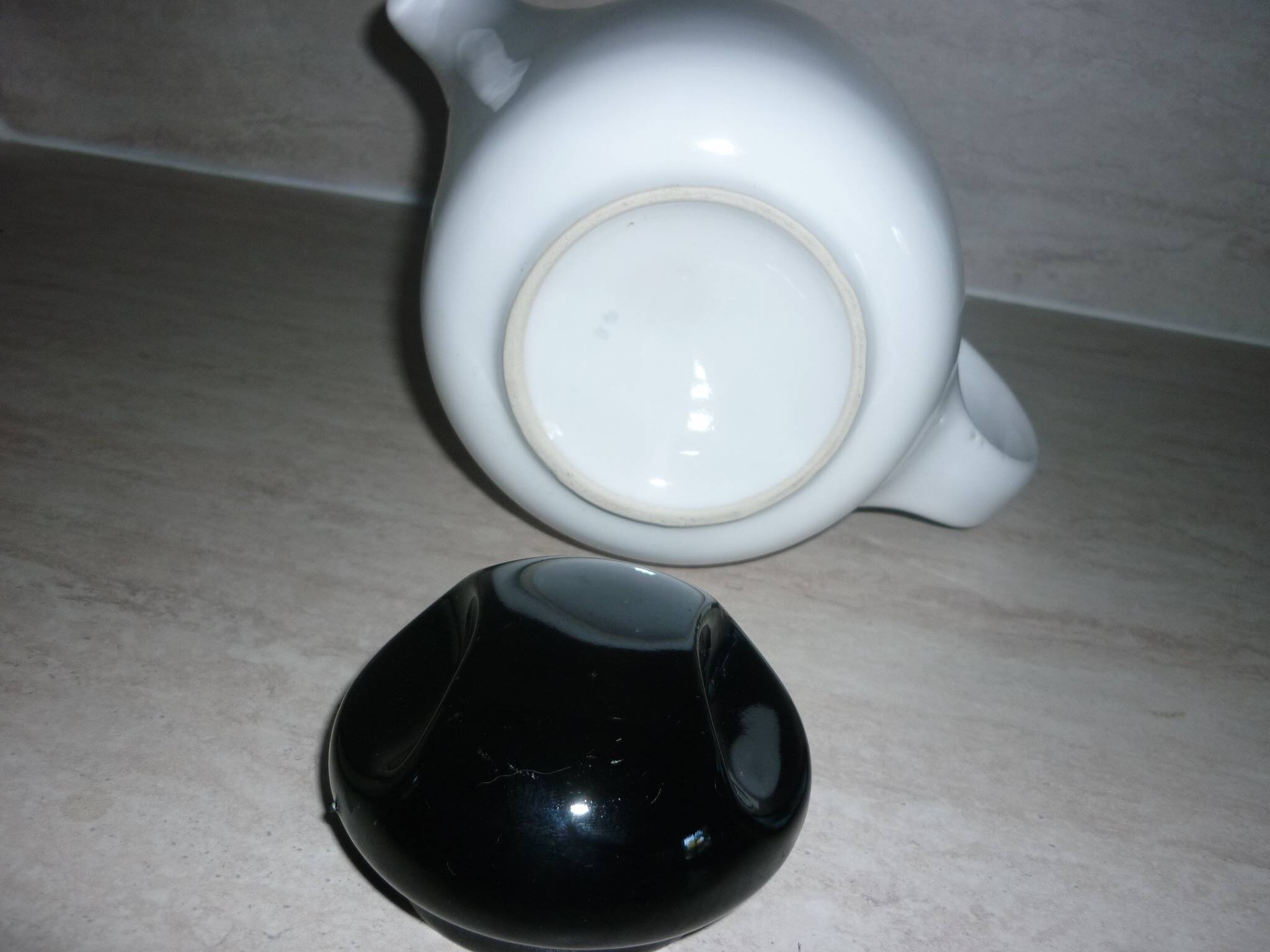 Black and white ceramic coffee maker