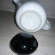 Black and white ceramic coffee maker