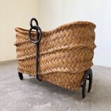 Magazine rack or log rack in straw with brutalist base from the 50s