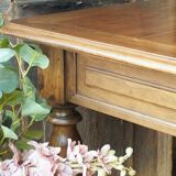 Old French farmhouse table in walnut with turned legs.