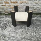 Low table in travertine and aluminium