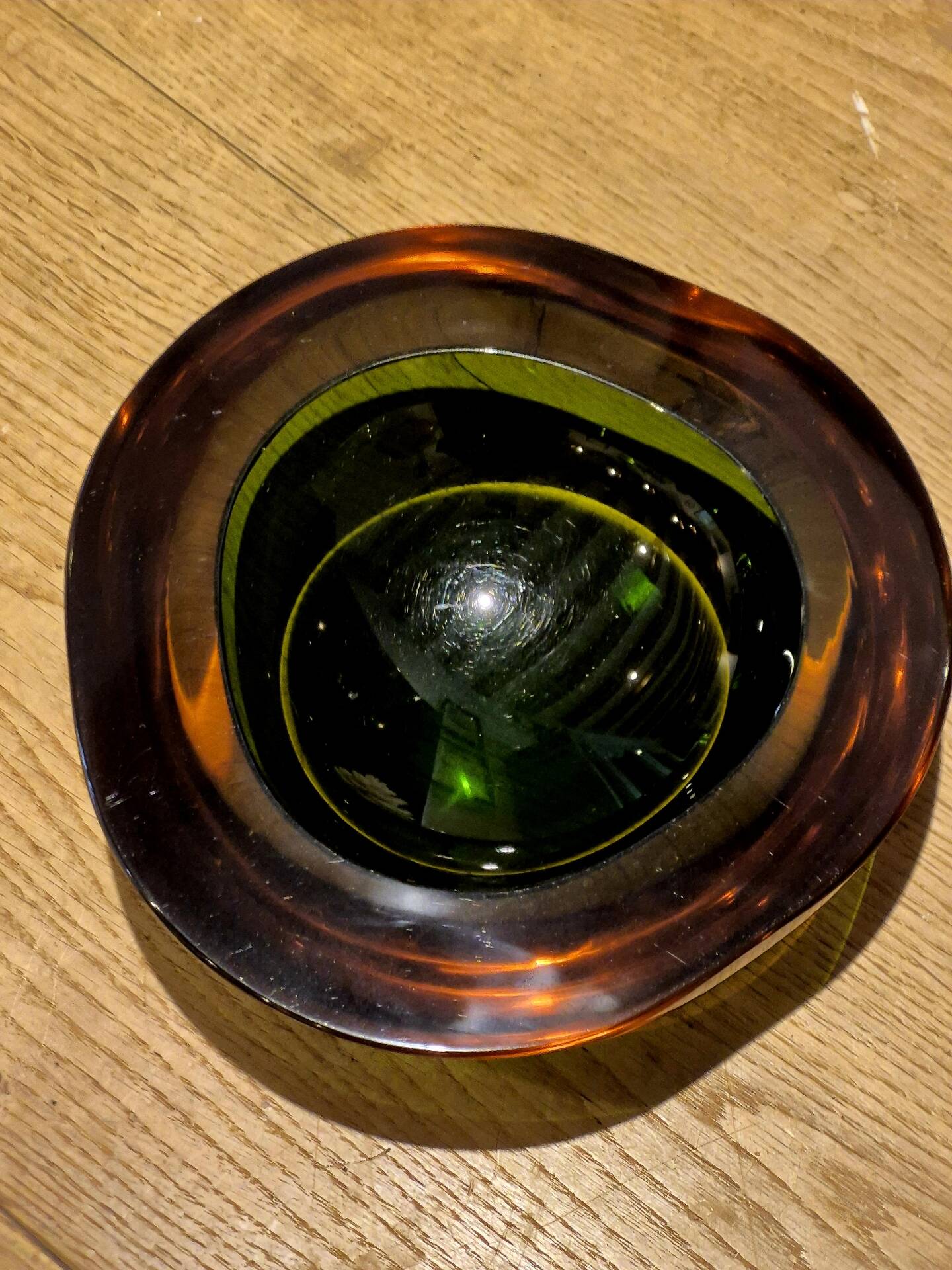 Large vintage Murano glass ashtray in olive green and amber.