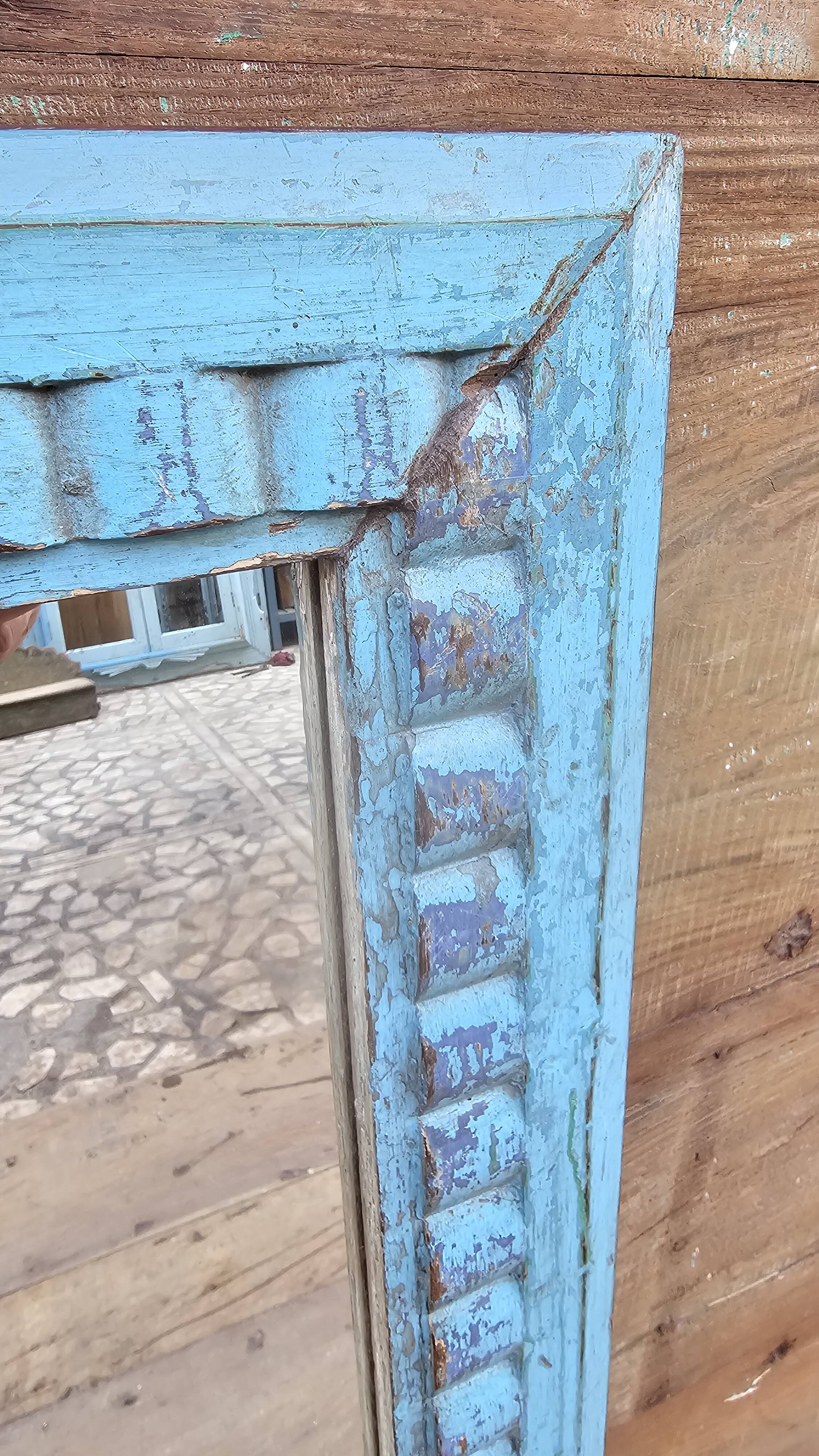 Antique Art Deco mirror in Burmese teak.