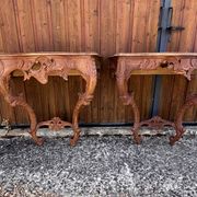 Pair of carved wall consoles in Louis XV style